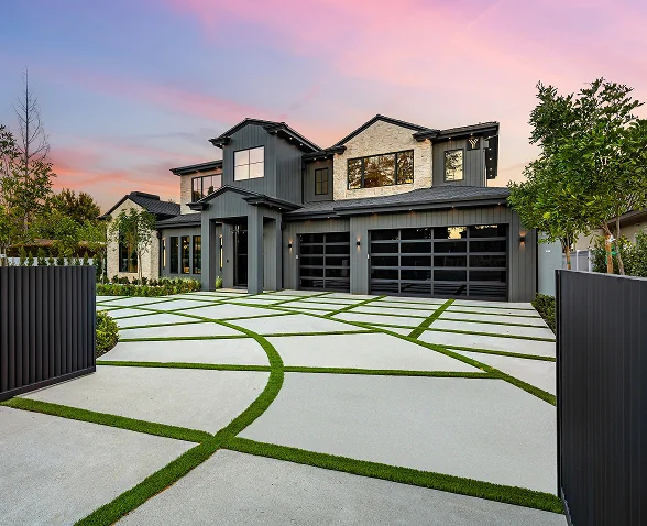 modern-house-with-designed-driveway-at-sunset-2025-02-10-06-40-21-utc